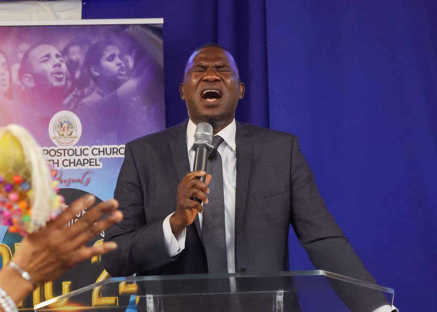 Pastor Amos preaching at CAC Faith Chapel